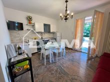 Bilocale arredato con giardino in bifamiliare 0105