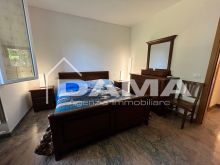 Bilocale arredato con giardino in bifamiliare 0128