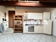 Mansarda Arredata con Travi a Vista nel Centro Storico in Corso Garibaldi 07