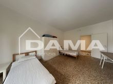 Ampio trilocale ristrutturato in palazzo storico_letto3