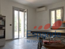Soggiorno con angolo cottura